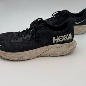 Men’s black and white Hoka 12.5, lots of tread, gently used.